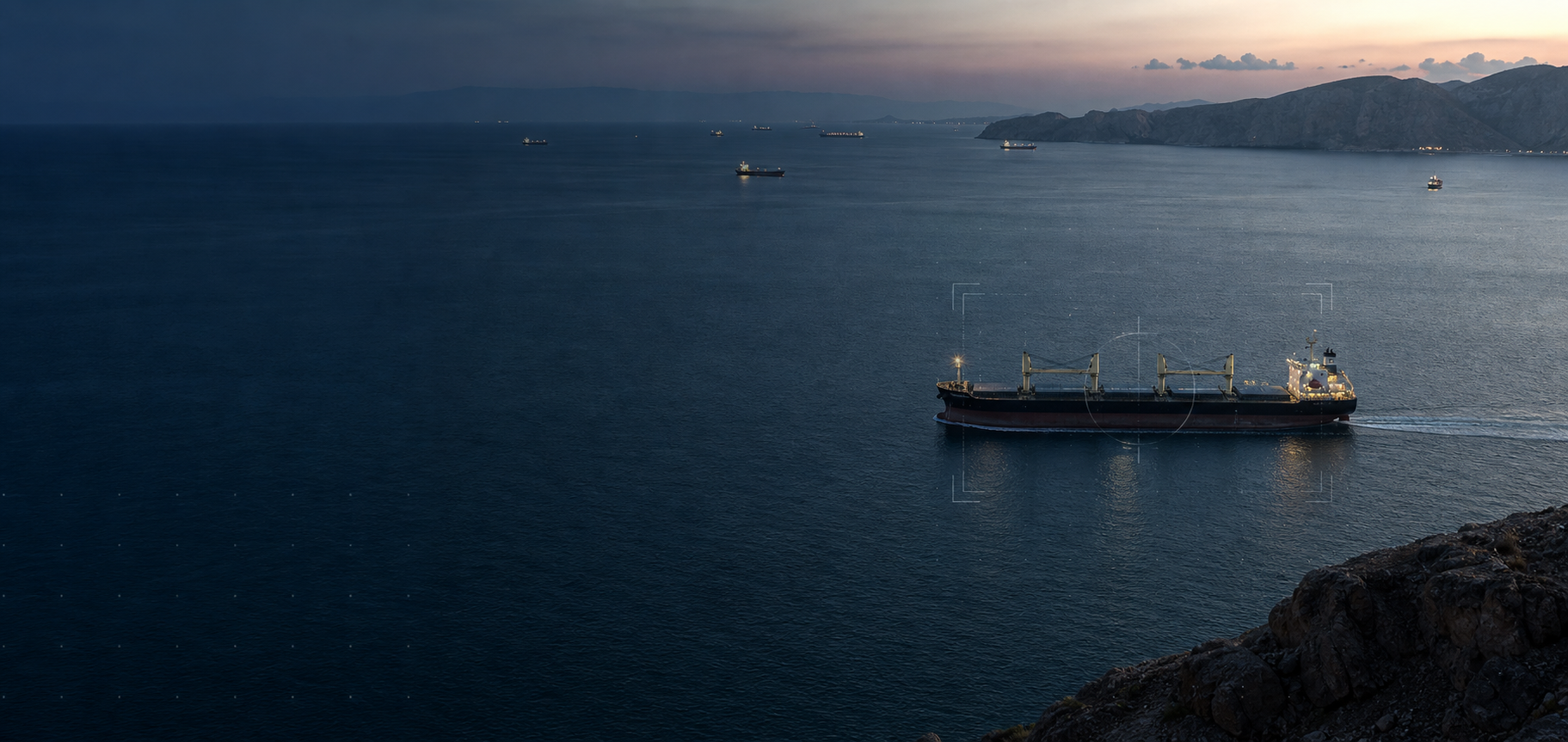 Bulk carrier observed from a safe coastal viewpoint in the Strait of Hormuz